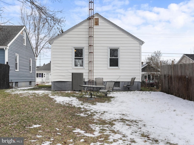 view of snow covered house