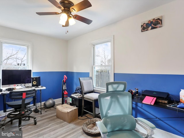 office area featuring ceiling fan and light hardwood / wood-style floors