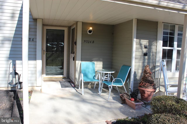 doorway to property with a patio