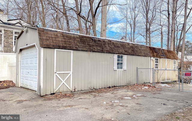 view of outbuilding with a garage