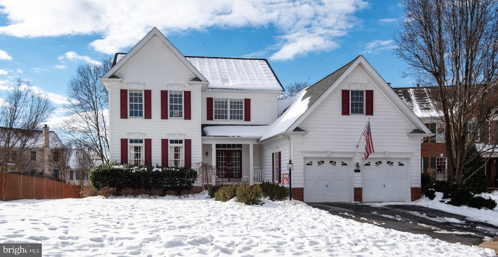 view of front of property featuring a garage