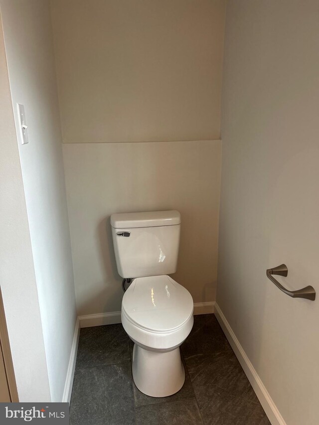 bathroom featuring toilet