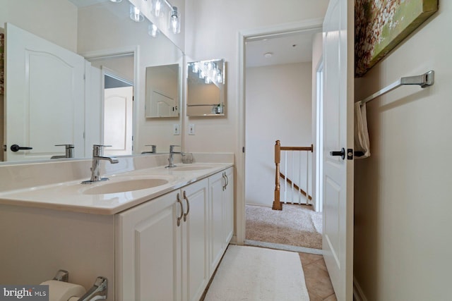 bathroom with vanity and tile patterned flooring