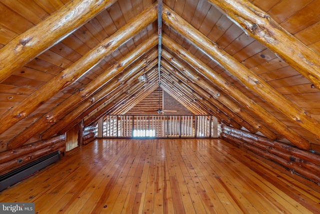 bonus room featuring wood ceiling, vaulted ceiling with beams, hardwood / wood-style floors, and a baseboard radiator