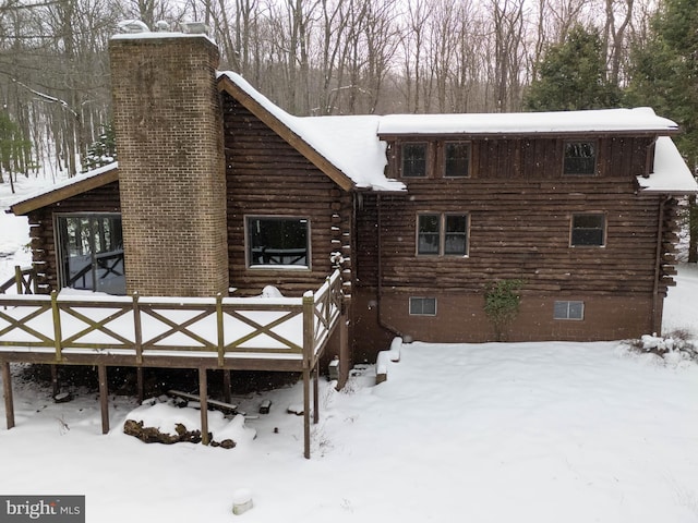 view of snow covered house