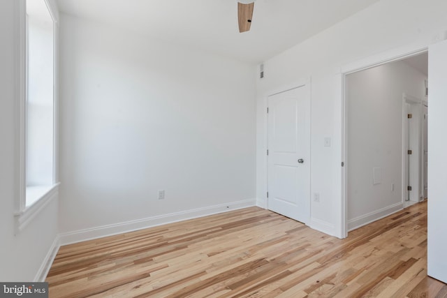 spare room with light wood-type flooring