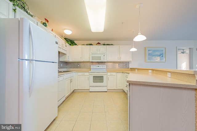 kitchen featuring white appliances, decorative light fixtures, tasteful backsplash, kitchen peninsula, and light tile patterned flooring