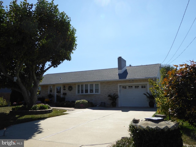 single story home with a garage