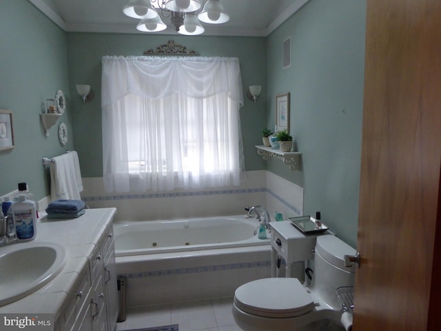 bathroom with vanity, tile patterned flooring, toilet, tiled tub, and a chandelier