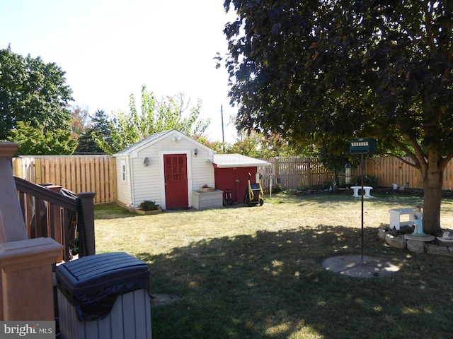 view of yard with a storage unit