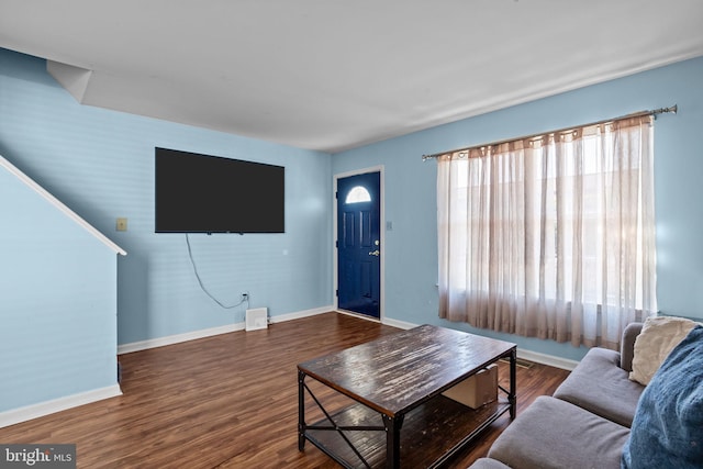 living room with dark wood-type flooring