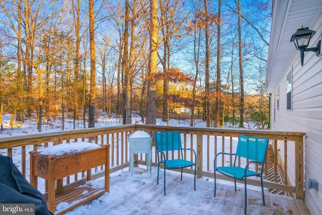 view of snow covered deck