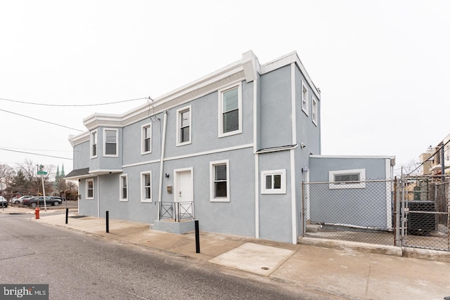 view of front of property with central AC