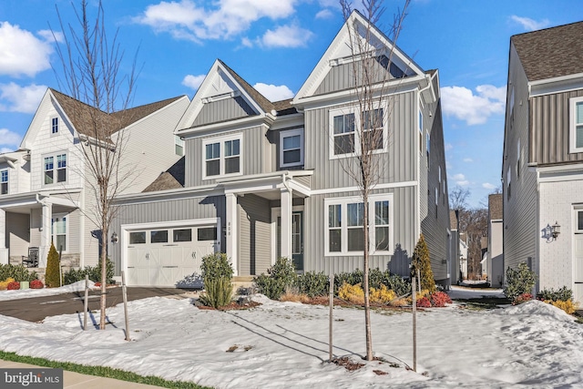 townhome / multi-family property featuring a garage