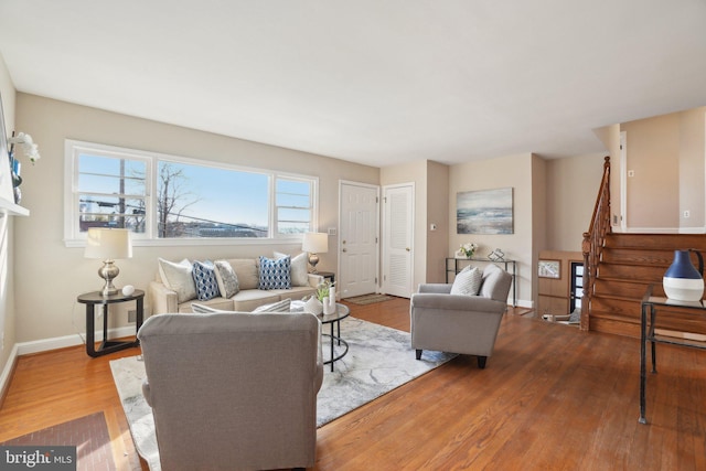 living room with light hardwood / wood-style floors