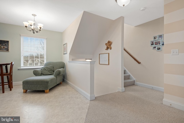 sitting room featuring a chandelier and light colored carpet