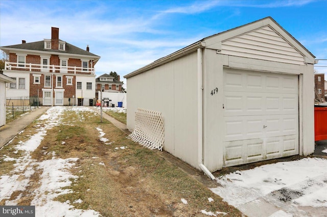 view of snow covered garage