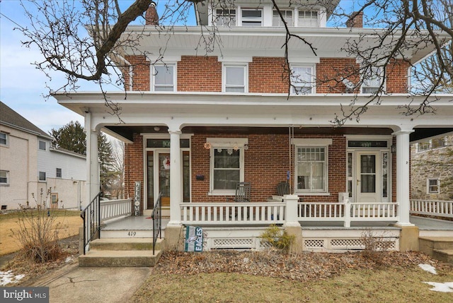 view of front of property featuring covered porch