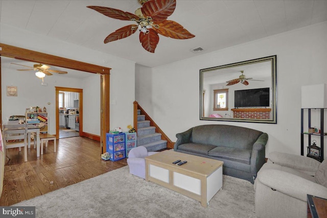 living room with light hardwood / wood-style flooring