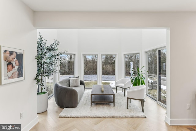 living room featuring light parquet floors