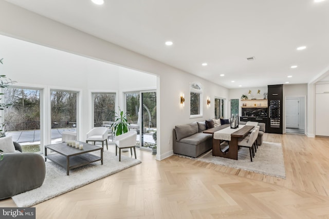 living room with light parquet floors