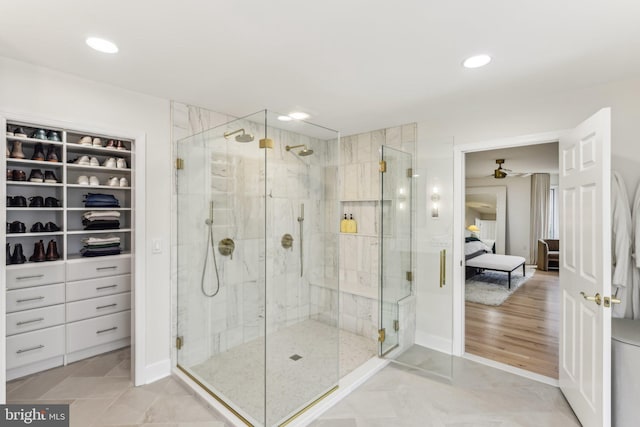 bathroom featuring a shower with door and tile patterned flooring