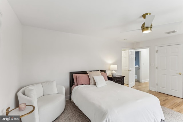 bedroom featuring light hardwood / wood-style flooring and ceiling fan