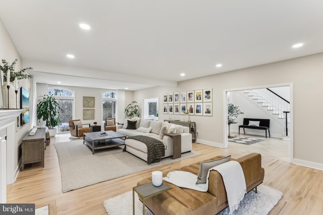 living room with light hardwood / wood-style floors