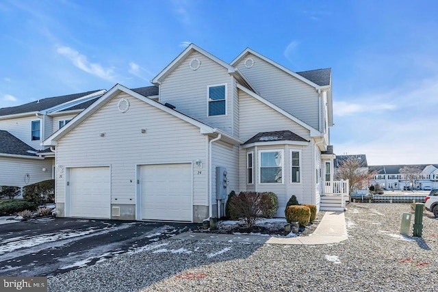 front of property featuring a garage