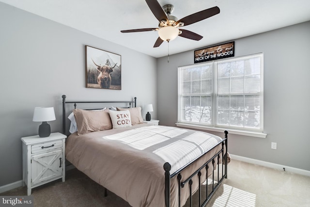 bedroom with ceiling fan and carpet floors