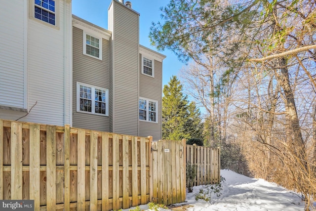 view of snow covered property