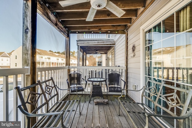 balcony featuring ceiling fan