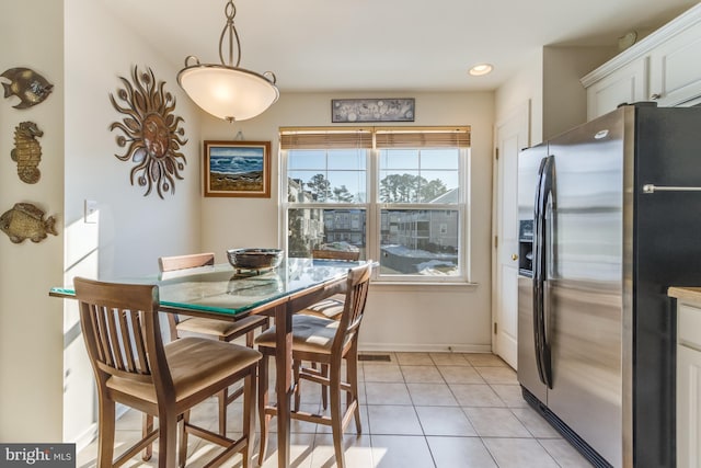 dining room with light tile patterned floors