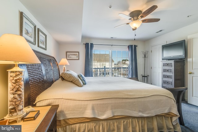 carpeted bedroom featuring ceiling fan and access to outside