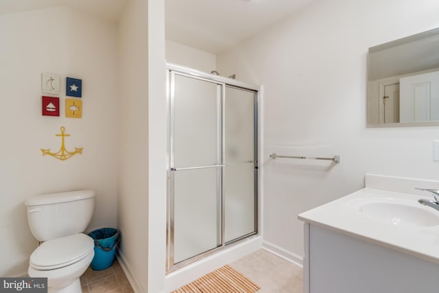 bathroom with toilet, an enclosed shower, tile patterned floors, and vanity