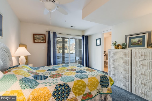 bedroom with ensuite bath, ceiling fan, and access to exterior