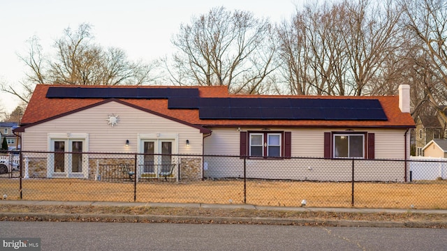 view of front of home featuring french doors