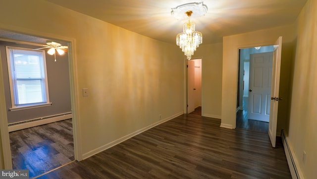 unfurnished room featuring baseboard heating, ceiling fan with notable chandelier, and dark hardwood / wood-style floors