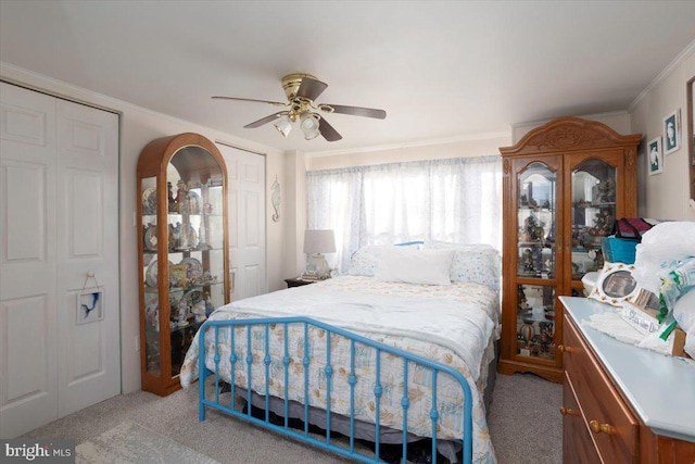 bedroom with ceiling fan, crown molding, and light carpet