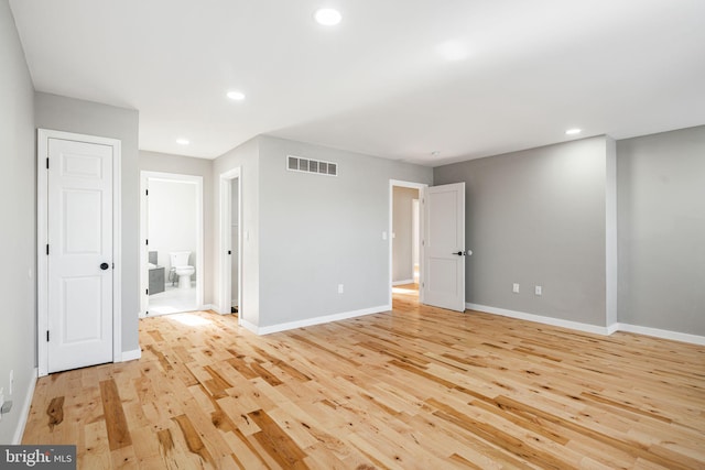 unfurnished room featuring light wood-type flooring