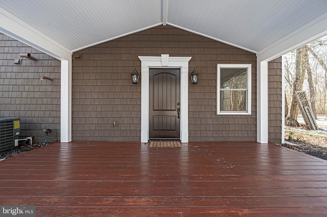 entrance to property featuring cooling unit