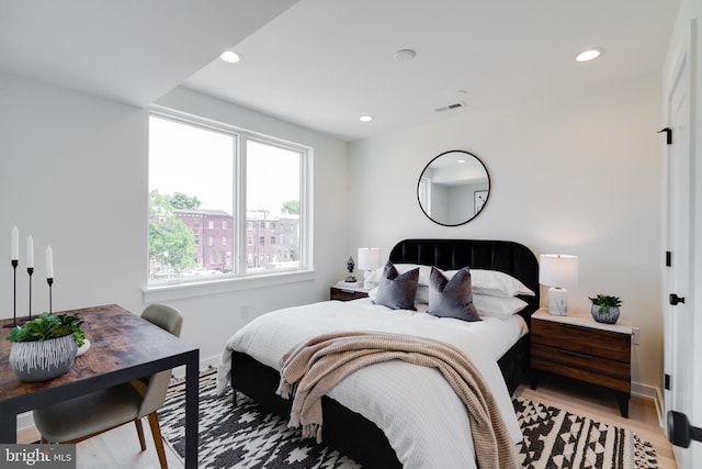 bedroom featuring light hardwood / wood-style flooring