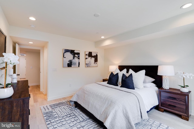 bedroom featuring light wood-type flooring