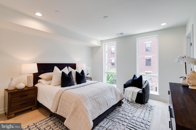 bedroom with light wood-type flooring