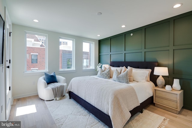 bedroom featuring light wood-type flooring