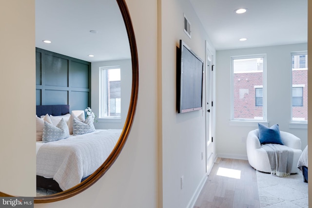 bedroom featuring light wood-type flooring