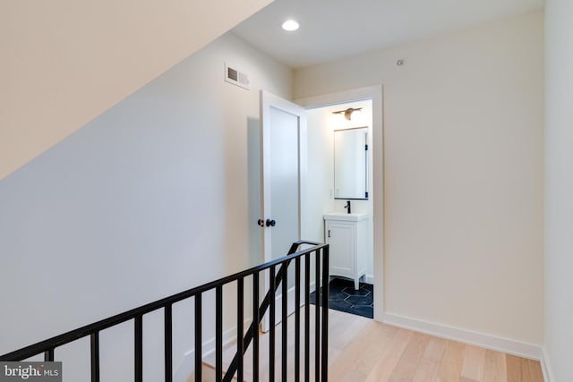 hallway featuring light hardwood / wood-style flooring