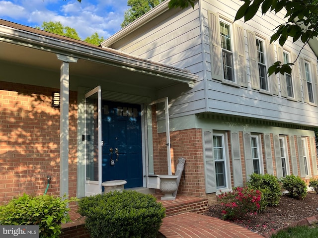 8107 Orville St, Alexandria, VA 22309 - view of exterior entry with brick siding and covered porch
