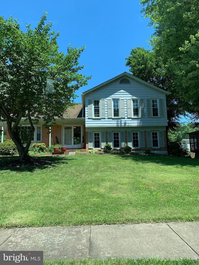 8107 Orville St, Alexandria, VA 22309 - tri-level home featuring a front lawn