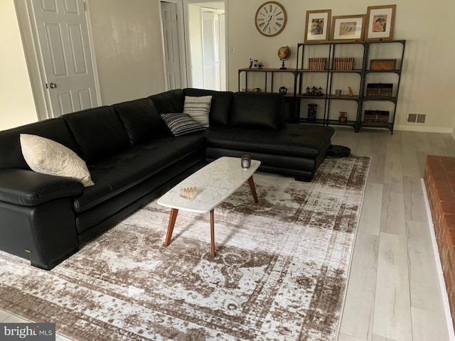 8107 Orville St, Alexandria, VA 22309 - living room featuring wood-type flooring, baseboards, and visible vents